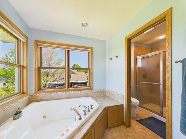 24850 Edenvale Trl, Elko New Market, MN 55020 - bathroom featuring a tub with jets, a stall shower, and tile patterned floors