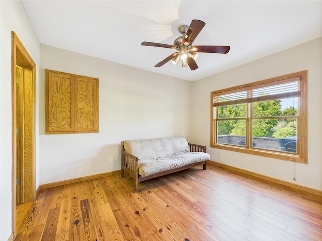 24850 Edenvale Trl, Elko New Market, MN 55020 - living area with ceiling fan and light wood-style flooring