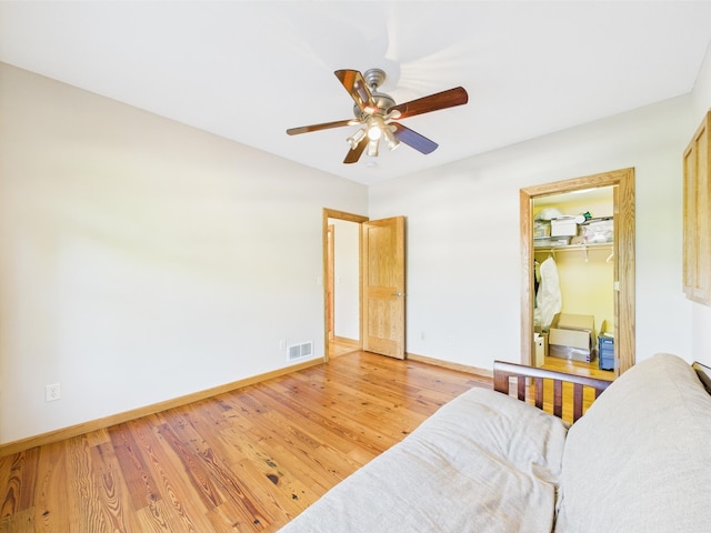 24850 Edenvale Trl, Elko New Market, MN 55020 - bedroom featuring a closet, light wood-type flooring, and a ceiling fan