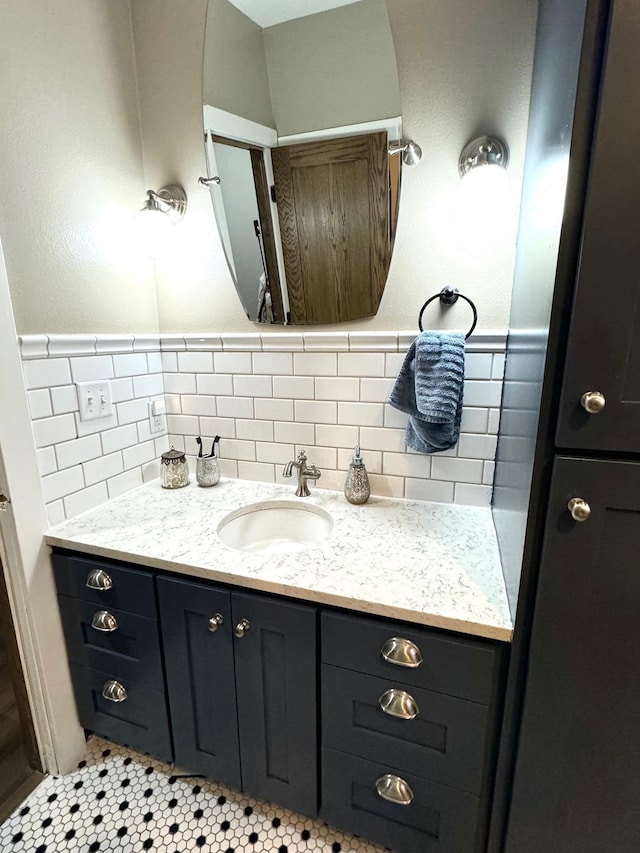 bathroom with vanity and tile patterned floors