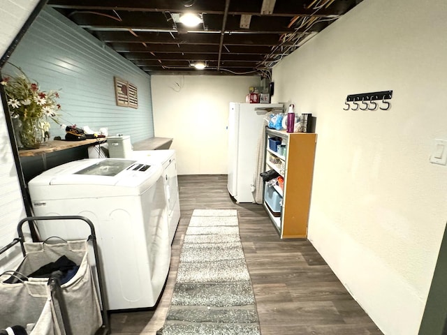 820 Labree Ave N, Thief River Falls, MN 56701 - laundry area with washer and clothes dryer and dark wood-type flooring