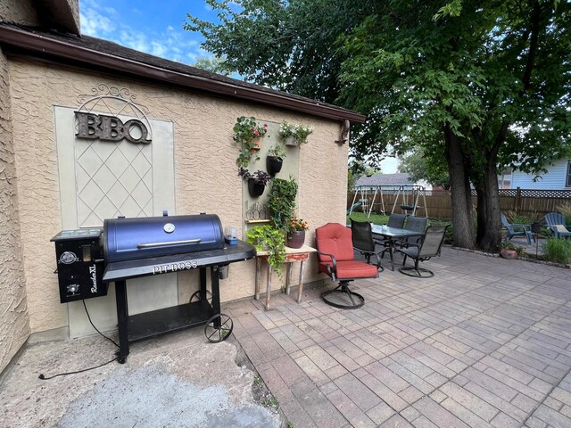 820 Labree Ave N, Thief River Falls, MN 56701 - view of patio featuring outdoor dining space and area for grilling