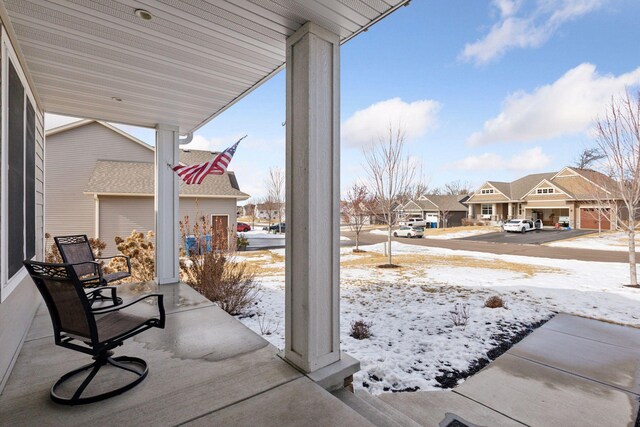 12770 196th Ave NW, Elk River, MN 55330 - snow covered patio featuring a residential view