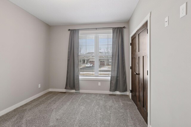 12770 196th Ave NW, Elk River, MN 55330 - carpeted spare room featuring baseboards