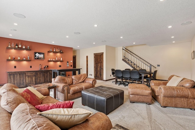 12770 196th Ave NW, Elk River, MN 55330 - living area with light colored carpet, wet bar, stairs, recessed lighting, and a textured ceiling