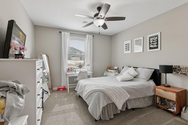 12770 196th Ave NW, Elk River, MN 55330 - bedroom with light colored carpet, a textured ceiling, and ceiling fan
