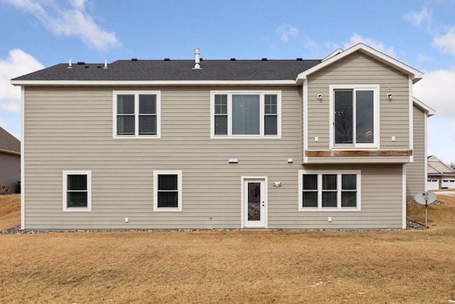 12770 196th Ave NW, Elk River, MN 55330 - rear view of house featuring a lawn