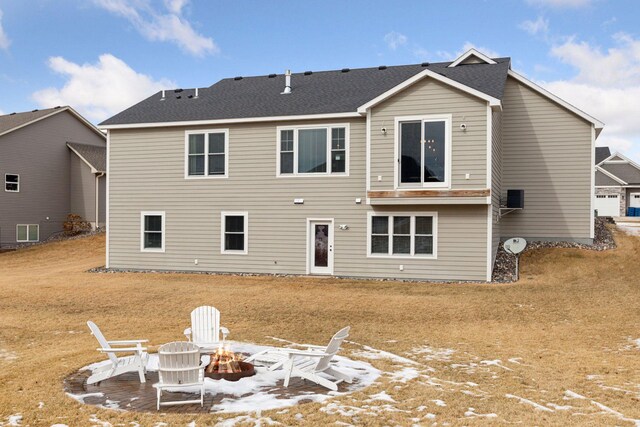 12770 196th Ave NW, Elk River, MN 55330 - back of property with an outdoor fire pit