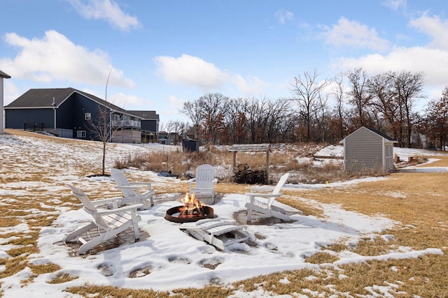 12770 196th Ave NW, Elk River, MN 55330 - yard covered in snow featuring a fire pit