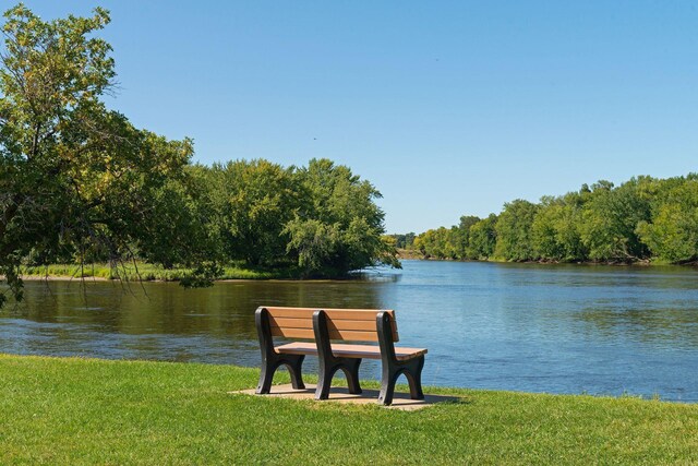 12770 196th Ave NW, Elk River, MN 55330 - dock featuring a water view, a yard, and a wooded view