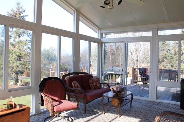 sunroom with a ceiling fan and a healthy amount of sunlight