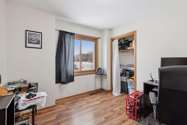 office area with hardwood / wood-style flooring