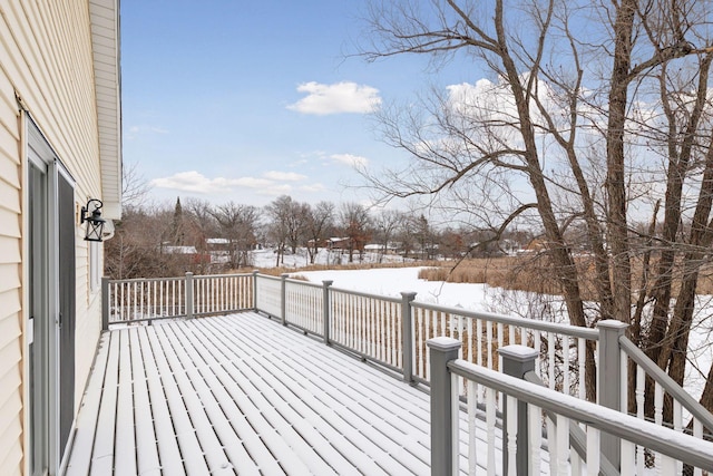 view of snow covered deck