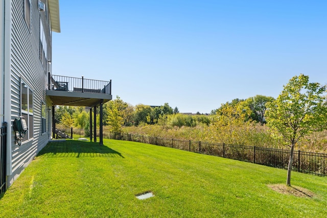 view of yard featuring stairway, a fenced backyard, and a deck