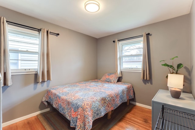 bedroom with light hardwood / wood-style flooring