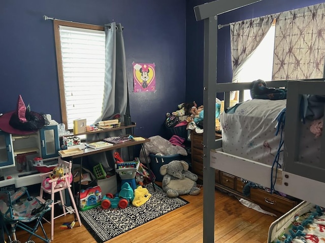 bedroom featuring wood-type flooring