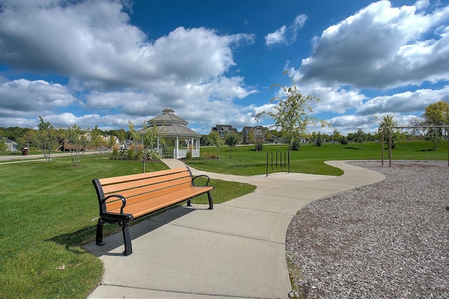 view of property's community featuring a gazebo and a lawn