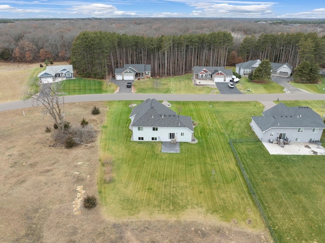 aerial view featuring a view of trees