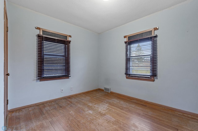 empty room with light wood-type flooring