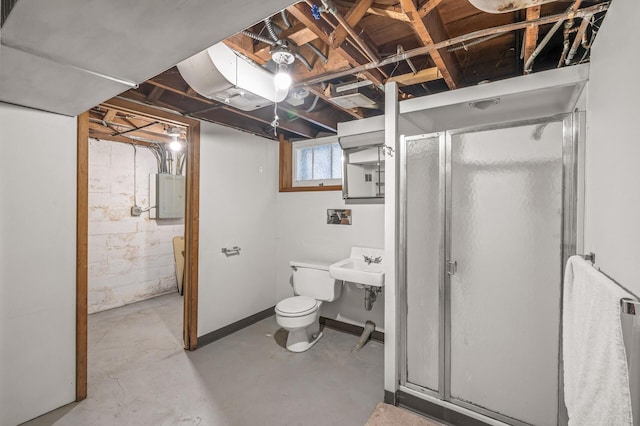 bathroom with sink, concrete floors, electric panel, toilet, and a shower with shower door