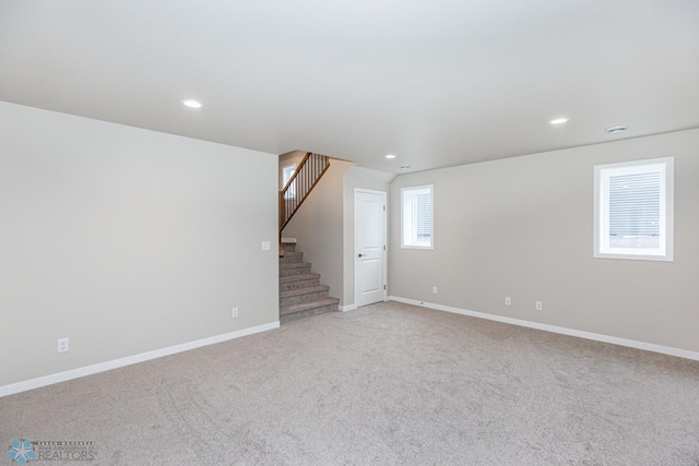 basement with light carpet