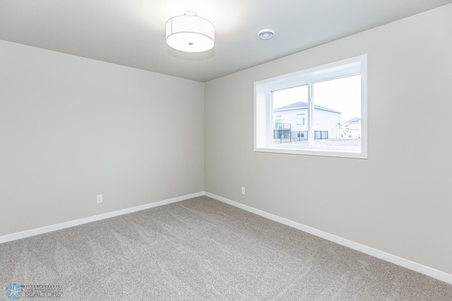 empty room with carpet floors