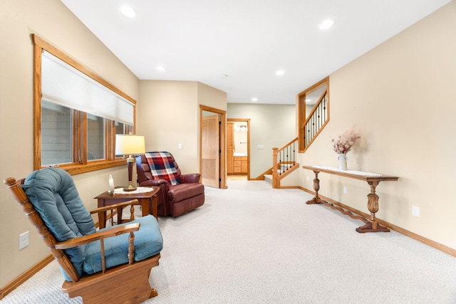 living area with carpet flooring