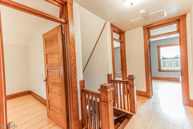 hall featuring light hardwood / wood-style floors