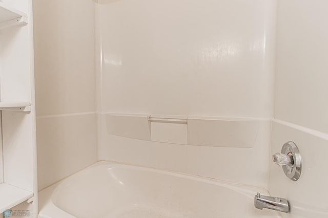 bathroom featuring washtub / shower combination