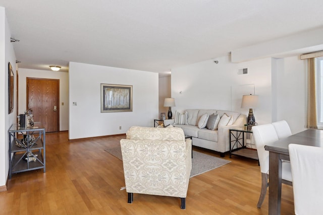 living room with hardwood / wood-style flooring