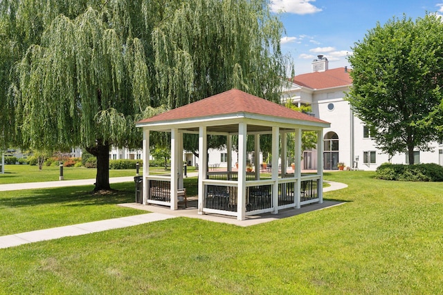 view of community with a gazebo and a lawn