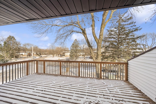 view of snow covered deck