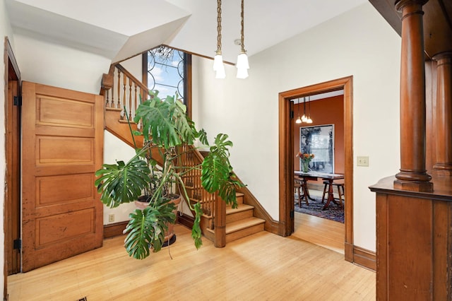 foyer entrance featuring wood-type flooring