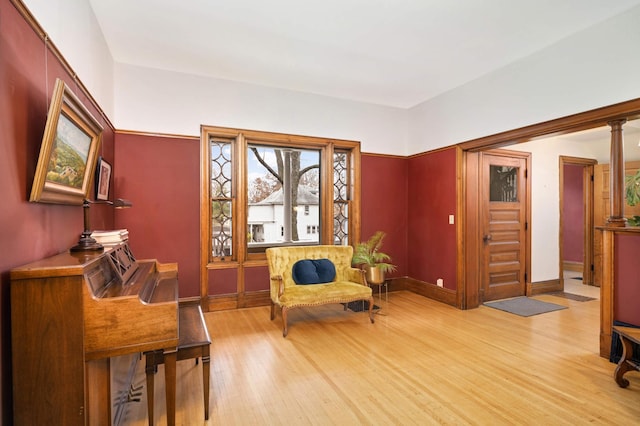 living area with light hardwood / wood-style flooring