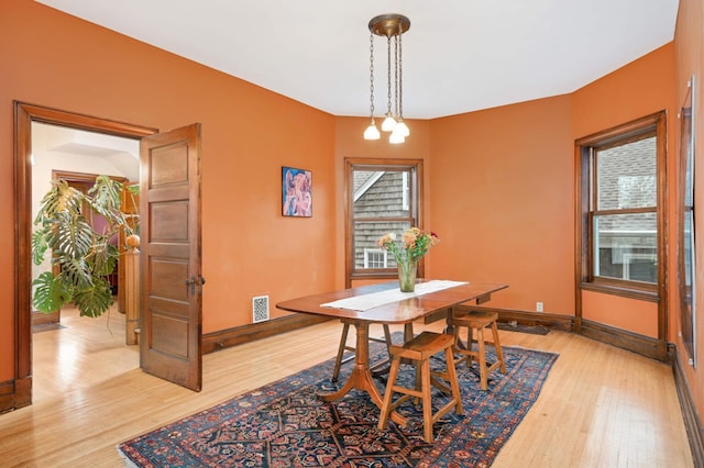 dining room featuring light hardwood / wood-style floors