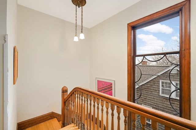 staircase featuring wood-type flooring