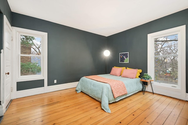 bedroom with light hardwood / wood-style flooring