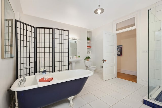 bathroom with toilet, separate shower and tub, and tile patterned floors