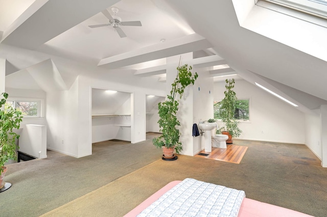 bonus room with lofted ceiling, carpet flooring, and ceiling fan