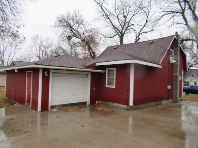 exterior space with a garage