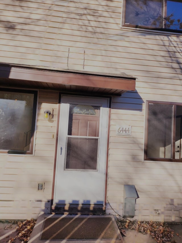 exterior details featuring wood walls