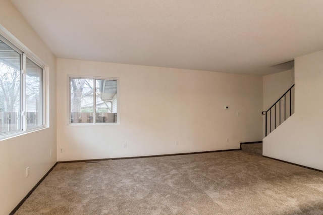 spare room with carpet flooring