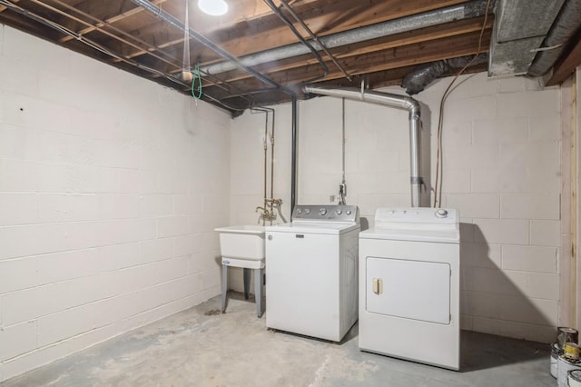 laundry room featuring washing machine and clothes dryer