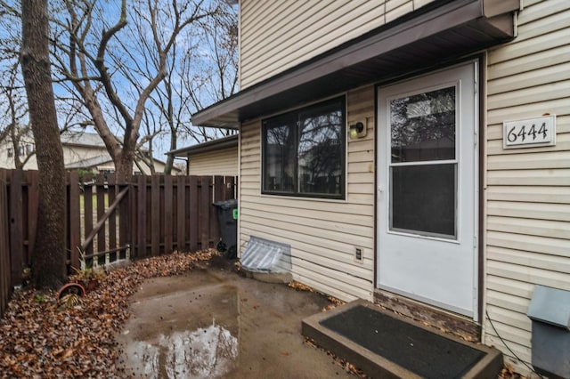 property entrance with a patio