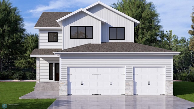 view of front facade featuring a front lawn and a garage