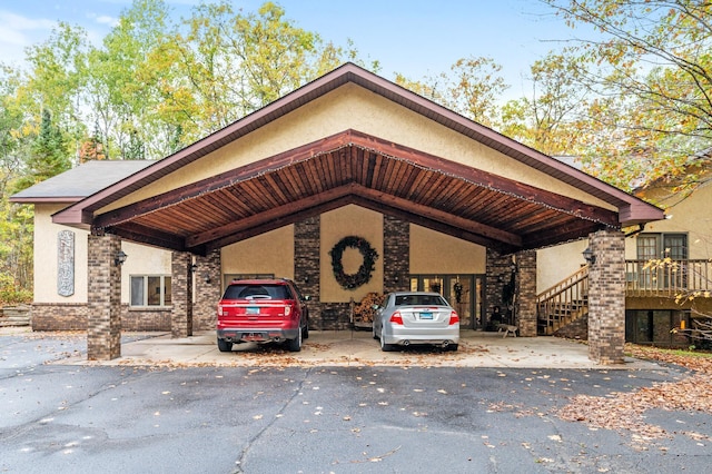 exterior space featuring a carport