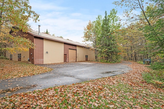 view of home's exterior with a garage