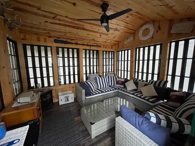 sunroom / solarium featuring vaulted ceiling, ceiling fan, and wood ceiling