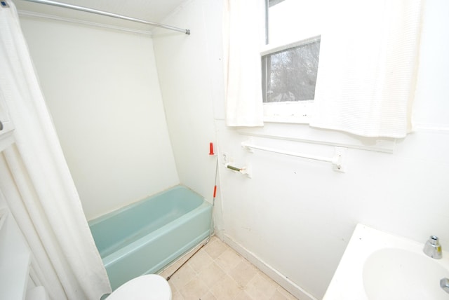 full bathroom with toilet, shower / tub combo, and sink