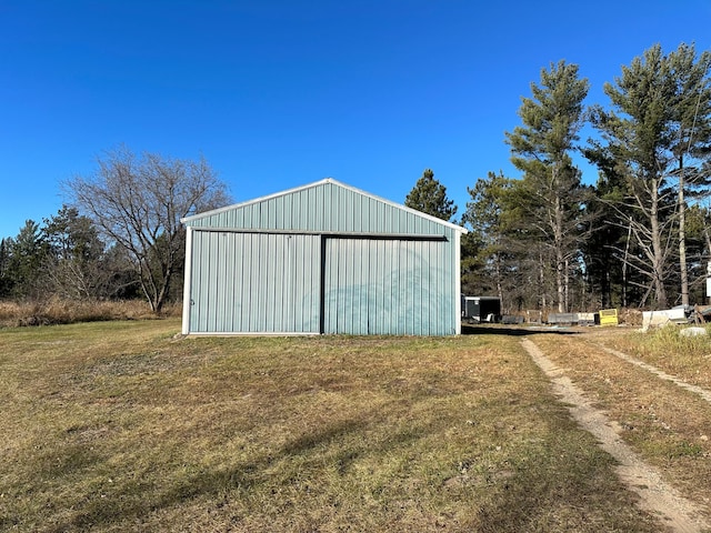 garage featuring a yard